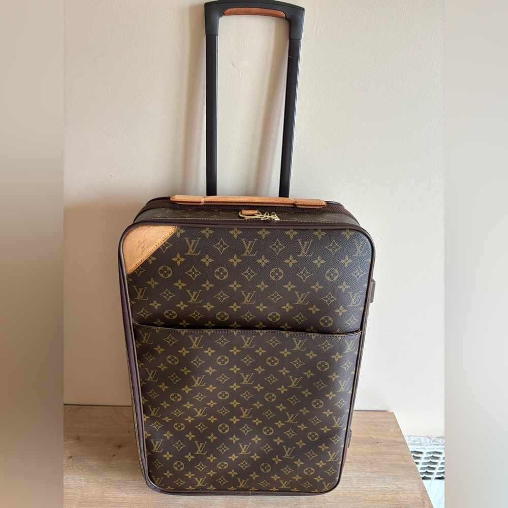 Louis Vuitton Monogram Rolling Carry-On in Brown and Tan